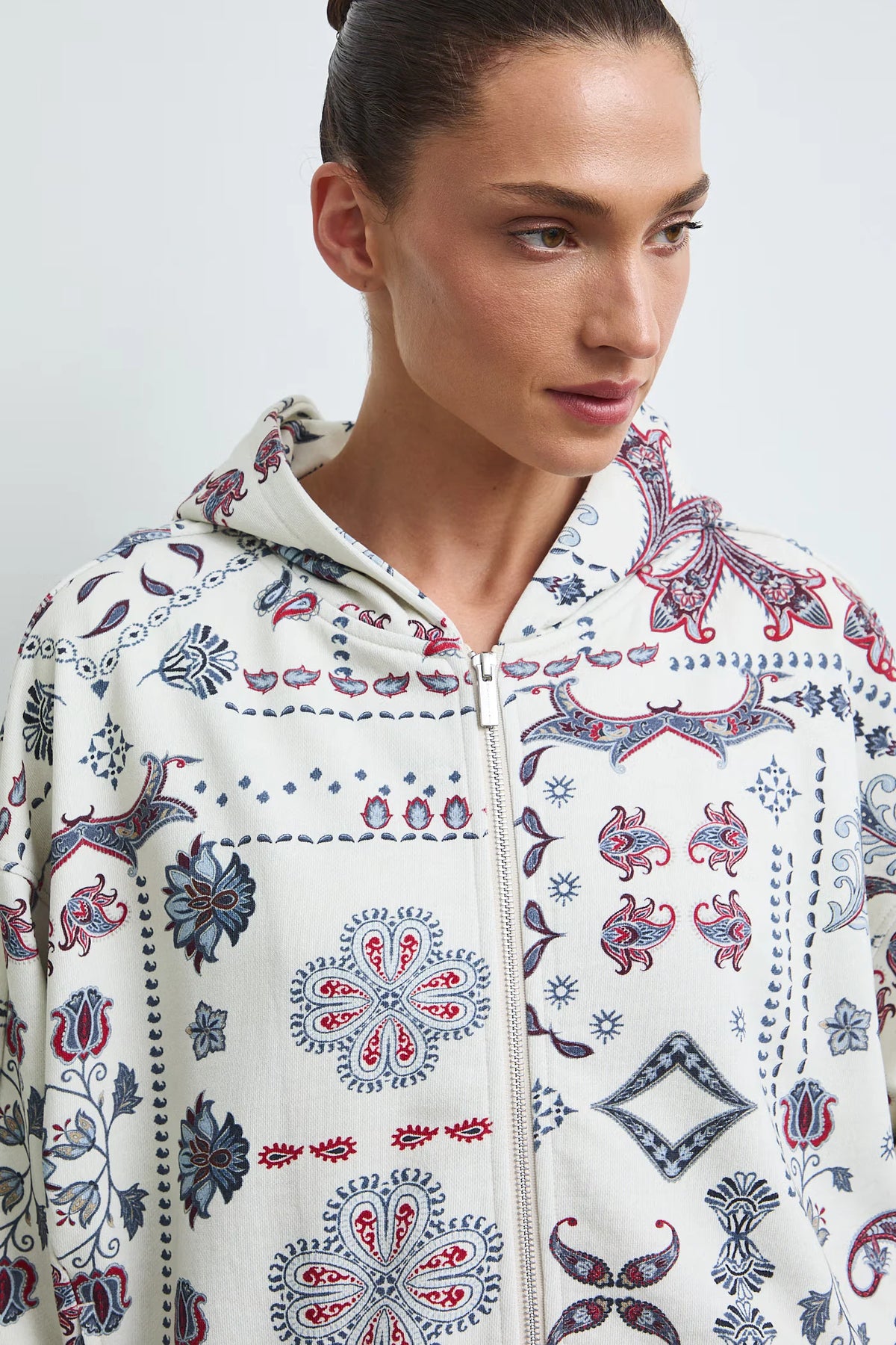 Damesvest met capuchon, ritssluiting en print